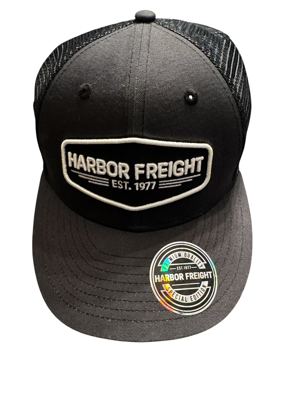 NWT Harbor Freight Black Mesh Back Trucker Cap, adjustable sizing.